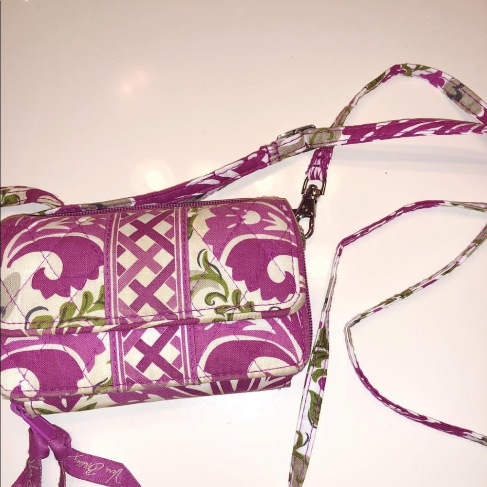 Patterned wallet with removable cross body strap